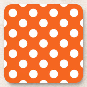 White polka dots on orange coaster
