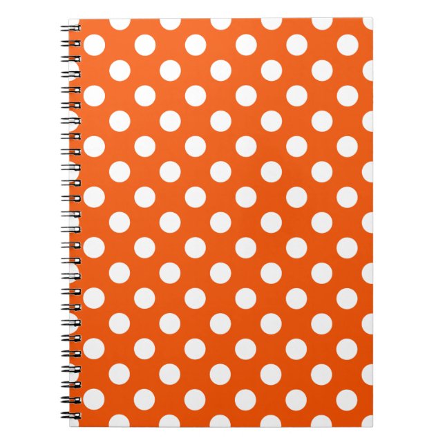 White polka dots on orange notebook (Front)