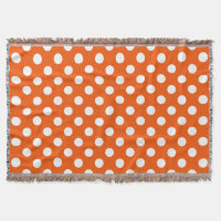 White polka dots on orange