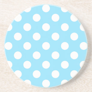 White polka dots on pale blue coaster
