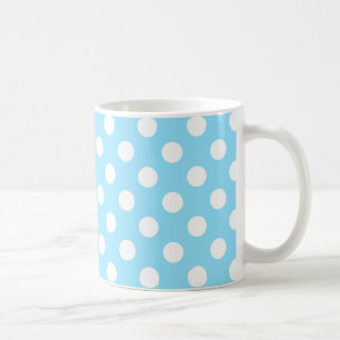 White polka dots on pale blue coffee mug