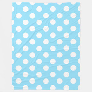 White polka dots on pale blue fleece blanket