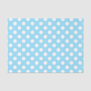 White polka dots on pale blue tissue paper