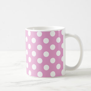 White polka dots on pale pink coffee mug