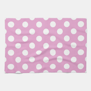 White polka dots on pale pink tea towel