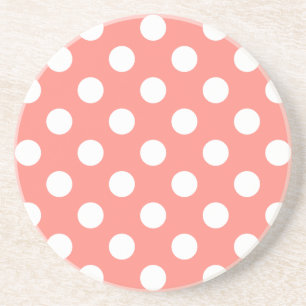 White polka dots on peach coaster