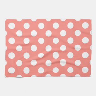 White polka dots on peach tea towel