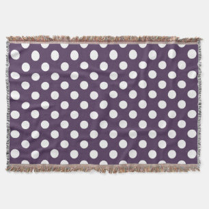 White polka dots on plum purple throw blanket
