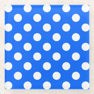 White polka dots on royal blue glass coaster