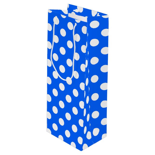 White polka dots on royal blue wine gift bag (Front Angled)
