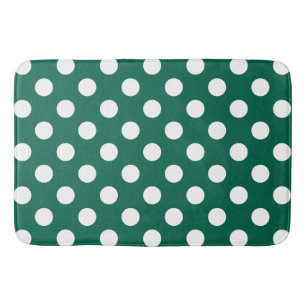 White polka dots on sage green bath mat