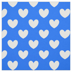White polka hearts on blue fabric