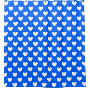 White polka hearts on blue shower curtain