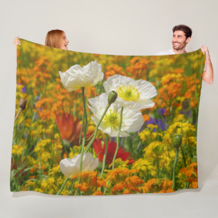 White poppies growing around the colourful flowers fleece blanket