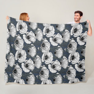 White poppies on navy fleece blanket