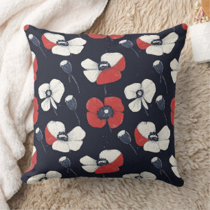 White Poppy Pattern with Red and Blue Accents Cushion