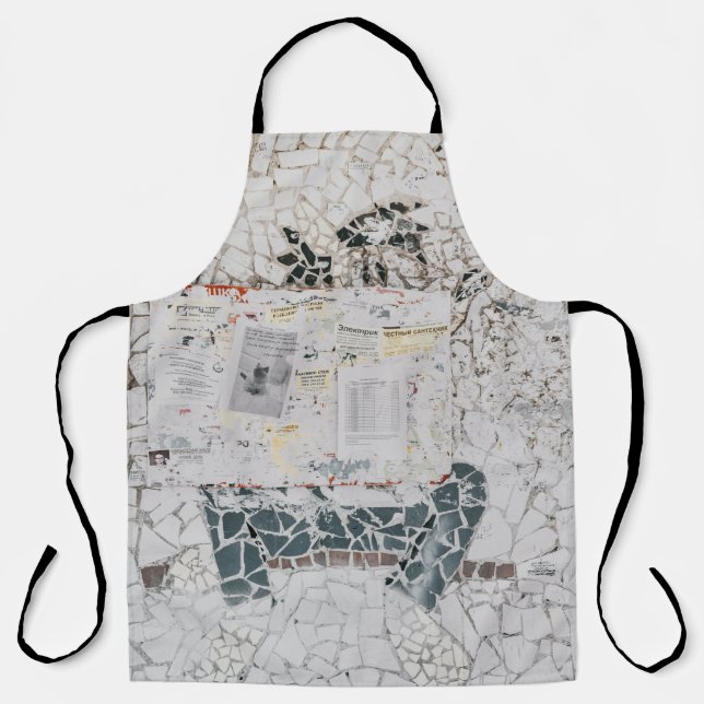 White printer paper on white and grey concrete wal apron (Front)