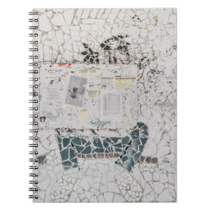 White printer paper on white and grey concrete wal notebook
