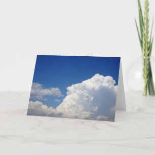 White Puffy Clouds in Blue Sky Background Card