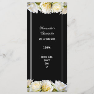 White roses on black church wedding program