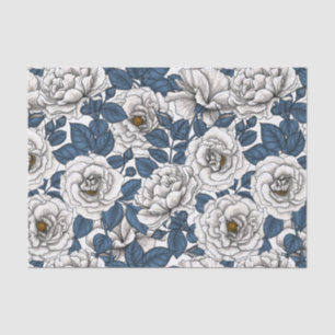 White roses with blue leaves on white tissue paper