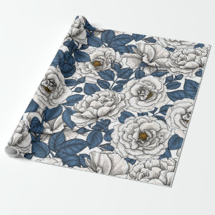 White roses with blue leaves on white wrapping paper