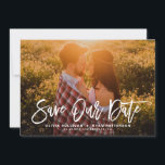 White Rustic Calligraphy Photo Save Our Date Save The Date<br><div class="desc">Stylish save the date announcement featuring rustic modern calligraphy with green leaves pattern. This will be a perfect save the date for spring and summer wedding. You can customise the back by adding your own pattern or adding another photo.</div>