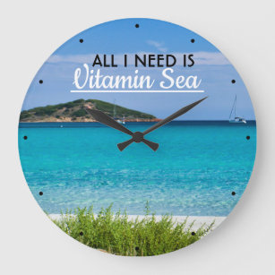 White sand beach with turquoise water vitamin sea large clock