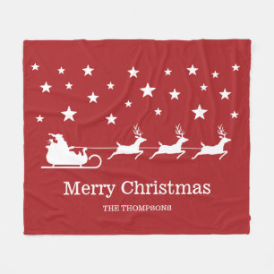 White Santa Sleigh And Merry Christmas Text On Red Fleece Blanket