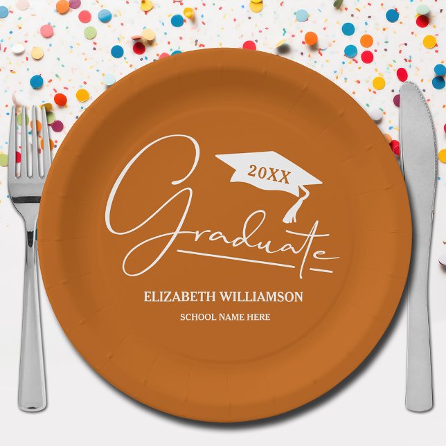 White Script Graduation Cap Burnt Orange Paper Plate (Your name, year, grad cap and "Graduate" in a cool script on burnt orange school color paper plates)