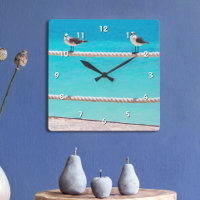 White seagull birds on rope with blue ocean photo
