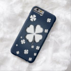White shamrocks on blue backgrounds