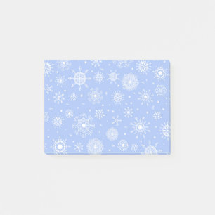 White snowflakes on blue post-it notes