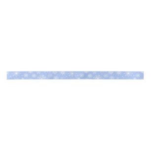 White snowflakes on blue satin ribbon