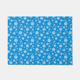 White Snowflakes on Mid Blue Winter Pattern Doormat