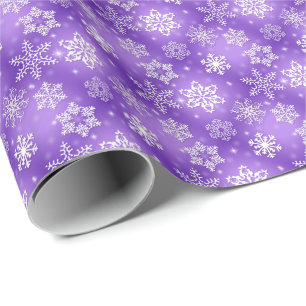 white snowflakes on purple wrapping paper