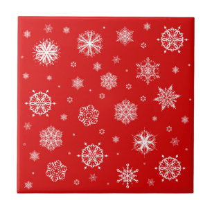 White snowflakes on red background ceramic tile