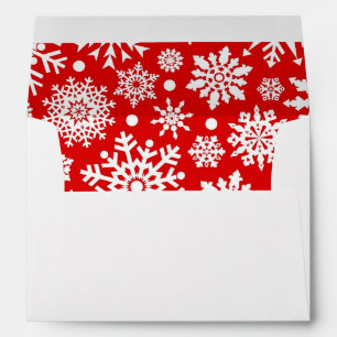 White snowflakes on red envelope