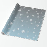 White Snowflakes on Silver Blue Wrapping Paper<br><div class="desc">Fun and festive wrapping paper features white snowflakes on a silvery blue gradient background.</div>
