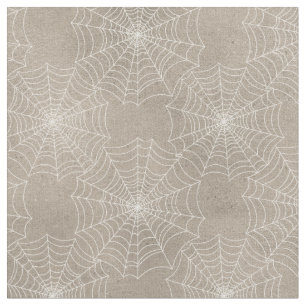 White Spider Webs on Tan Fabric