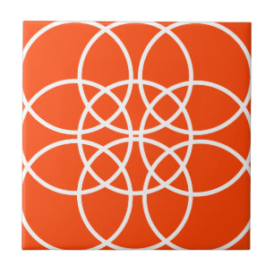 White Spiral Circles on Bright Orange Ceramic Tile