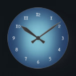 White spotlight on blue round clock<br><div class="desc">White spotlight glow on a blue background</div>
