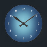 White spotlight on blue round clock<br><div class="desc">White spotlight glow on a blue background</div>