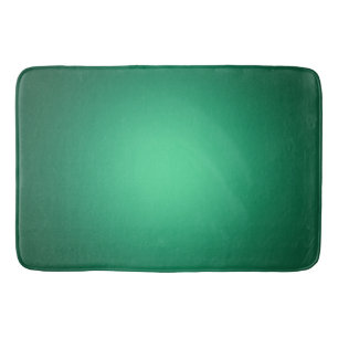 White spotlight on green bath mat