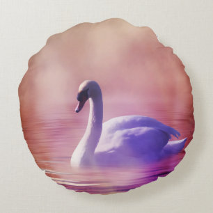 White Swan floating on a misty lake Round Cushion