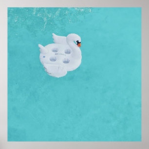 White swan inflatable on body of water poster