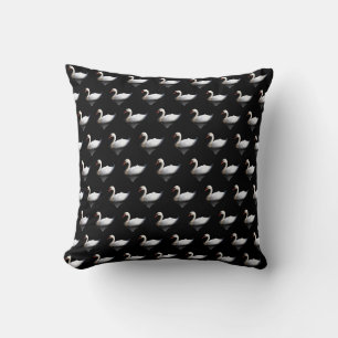 White swan on black cushion