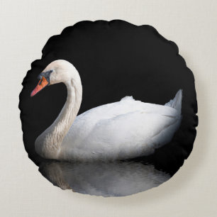 White swan on black round cushion