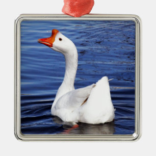 white swimming goose in blue water metal tree decoration