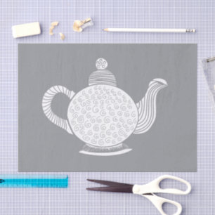 White Teapot on Grey Tissue Paper